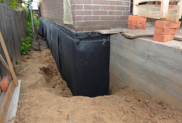 Happy homeowners after waterproofing job in Runnemede